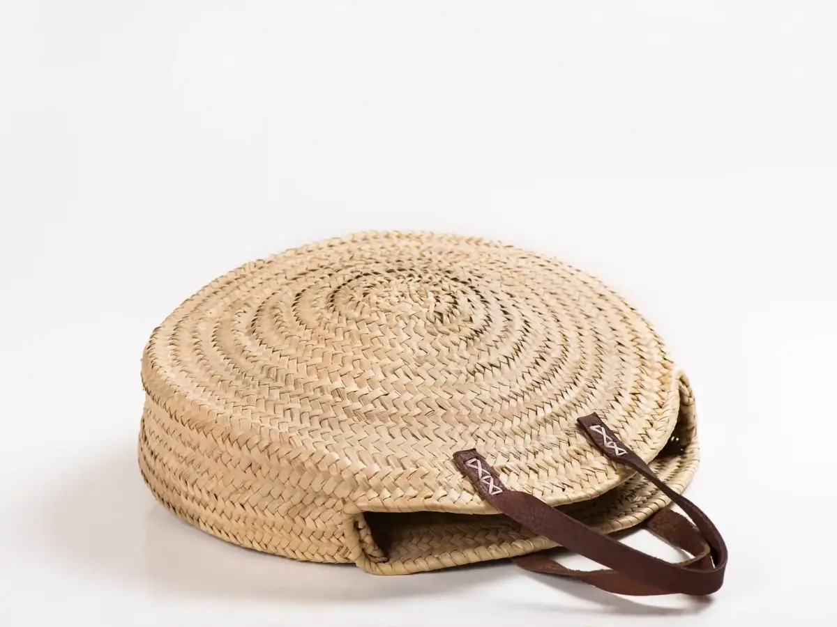 Round Straw Bag With Leather Handles - Image 1