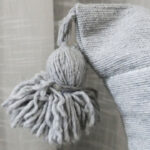 Moroccan Pompom Pillow – White with Silver Stripes, Handwoven Cotton Cushion Cover